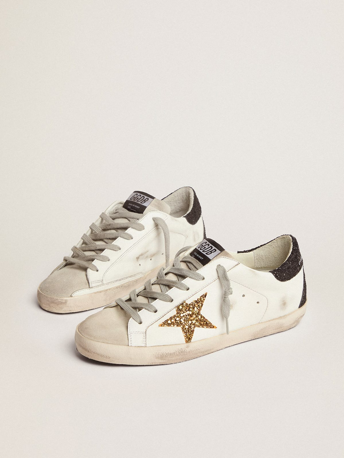 Golden Goose Women's Super Star with Gold Star and Black Glitter Heel Tab