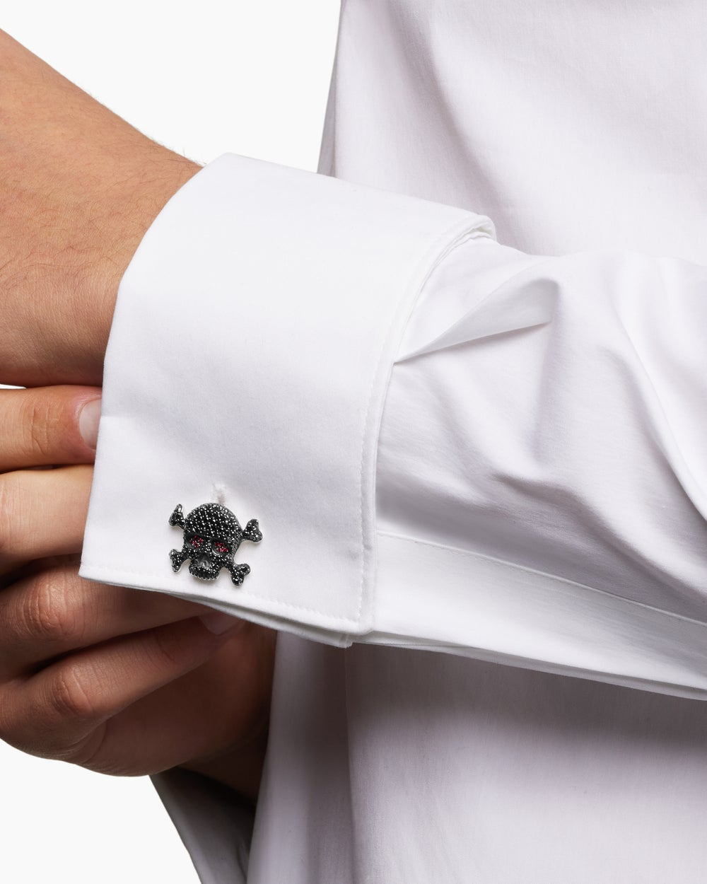DAVID YURMAN MEMENTO MORI SKULL CUFFLINKS STERLING SILVER WITH BLACK DIAMONDS AND RUBIES, 24MM