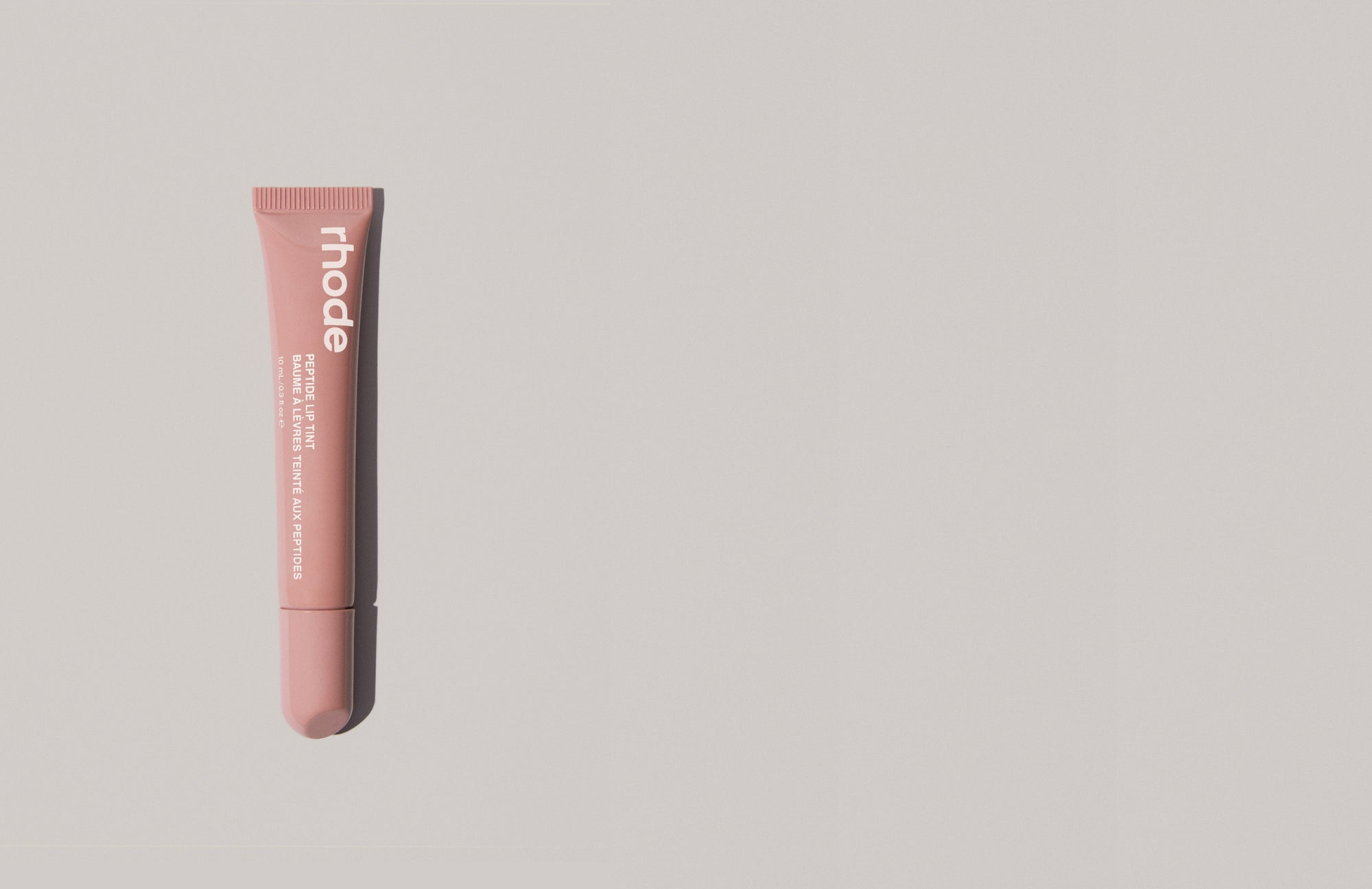 RHODE PEPTIDE LIP TINT  THE TINTED LIP LAYER  ROSE TAUPE