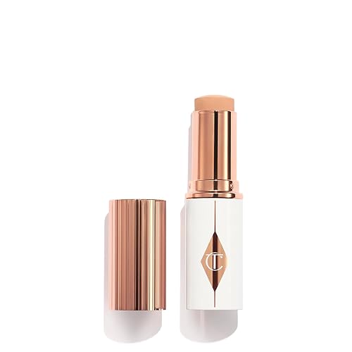 CHARLOTTE TILBURY UNREAL SKIN TINT SHEER GLOW HYDRATING FOUNDATION STICK - LIGHTWEIGHT CREAM